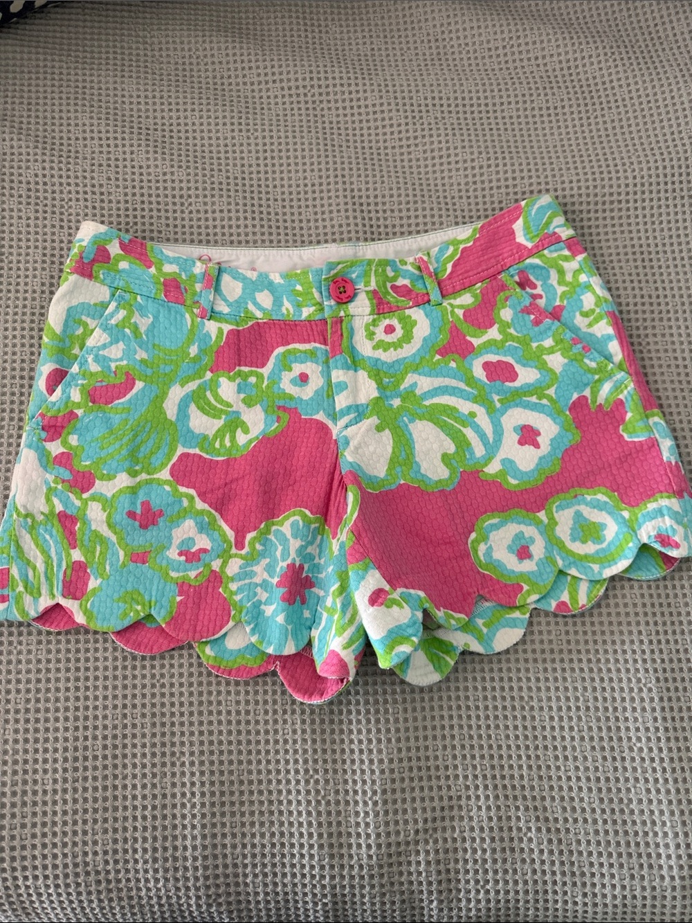 Lily Pulitzer Buttercup short in bright fuchsia and green and blue colors.